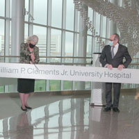 UT Southwestern leaders cut the ribbon opening the third tower of Clements University Hospital